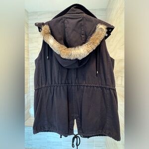 Black vest with detachable faux fur trim hood